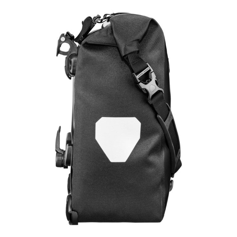 Ortlieb Classic pannier black, end view showing shoulder strap and reflective patch